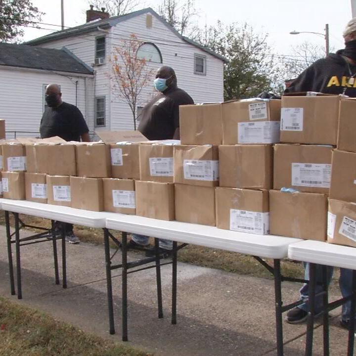 Community Connections Group giving boxes of chicken to 400 families in the Portland neighborhood